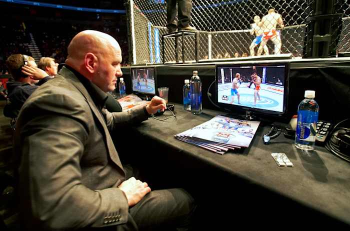 White, cage-side, in 2012.